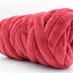 A collection of soft, chunky velvet yarn in a variety of beautiful colors, neatly arranged to showcase the available options for a handmade chunky knit blanket. The vibrant and neutral shades allow for a perfect match to any home décor style.