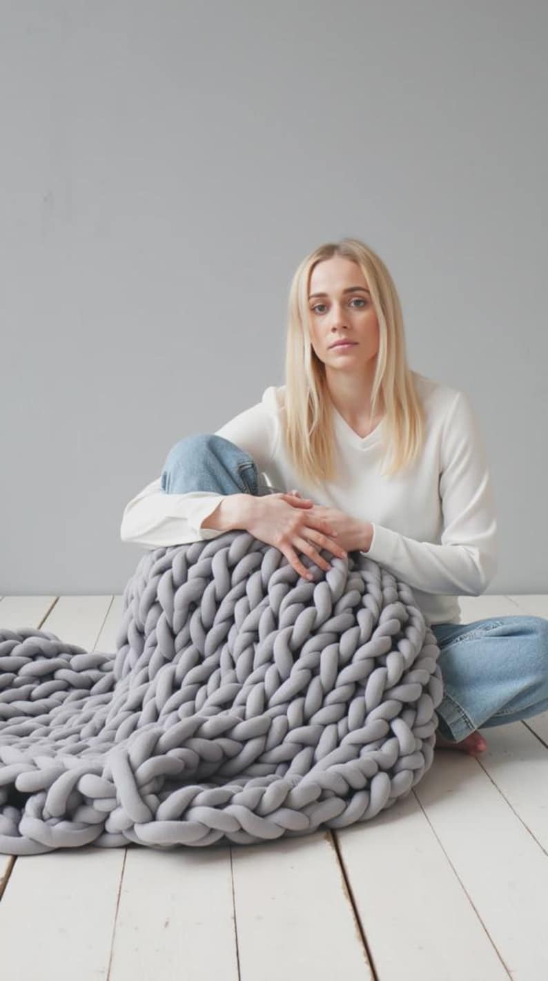 Chunky knitted cotton weighted blanket for adults and children displayed in multiple sizes from small to king size