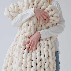 Chunky knitted cotton weighted blanket for adults and children displayed in multiple sizes from small to king size