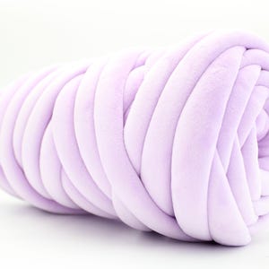 A collection of soft, chunky velvet yarn in a variety of beautiful colors, neatly arranged to showcase the available options for a handmade chunky knit blanket. The vibrant and neutral shades allow for a perfect match to any home décor style.