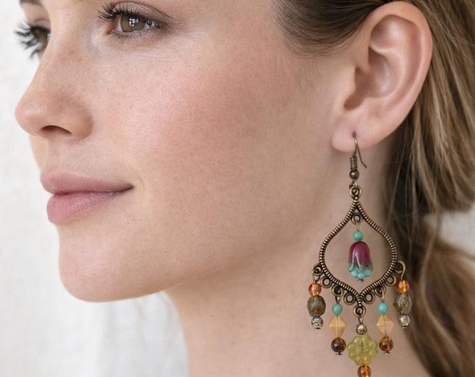 Boucle oreille associés à des bruns chaleureux composent une palette naturelle et apaisante, tandis que de délicates touches de topaze