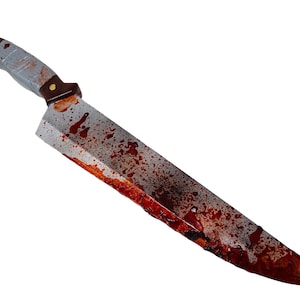 May include: A large, silver knife with a brown handle is covered in red blood splatters. The knife is a prop for Halloween or a costume.