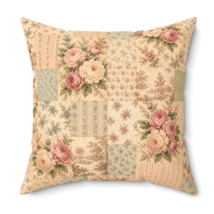 May include: A square throw pillow featuring a patchwork design with various fabric patterns. The print includes clusters of pink and cream peonies, small blue floral sprigs, vertical stripes, and a sepia-toned landscape scene on a cream background.