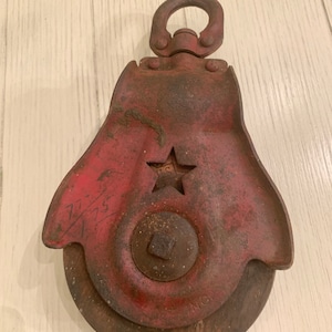 iron pulley, large antique pulley,original red paint, star cutout, starline steampunk,industrial