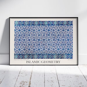 May include: Framed print featuring a detailed pattern in shades of blue and white, reminiscent of traditional Islamic tilework. The text "Islamic Geometry" is displayed in a clean, sans-serif font at the bottom of the print.