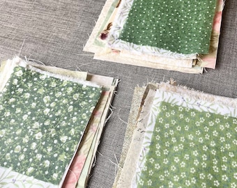 Green fabric snippet bundle, 15 assorted pieces cut from cotton  textiles.
