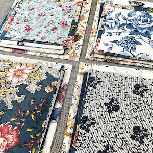 Blue fabric snippet bundle, 15 assorted pieces cut from cotton  textiles.