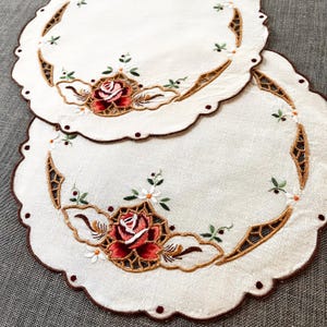 Two Vintage Embroidered Linen Doilies, embroidery of roses with cutwork details