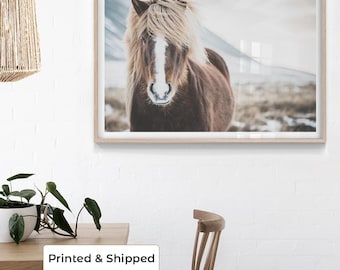 May include: Framed print featuring a brown horse with a light-colored mane and a white stripe on its face. The horse is set against a blurred, neutral-toned background. The text "Printed & Shipped" is at the bottom.