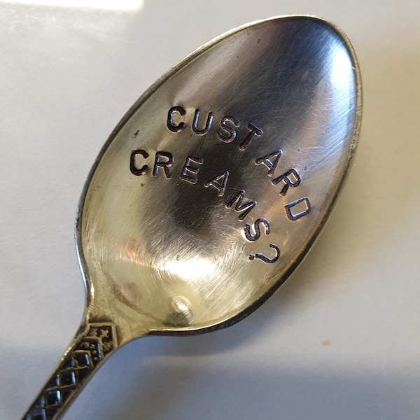 hand stamped tea spoon custard creams ?