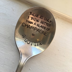 Hand stamped spoon there is only one thing better than a glass of champagne a bottle