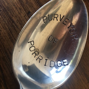 Hand stamped cereal dessert spoon purveyor of porrige