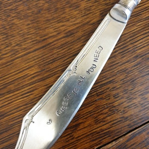 hand stamped cheese knife cheese is all you need