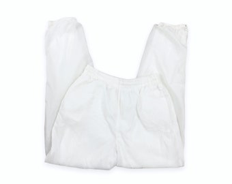 VTG 90s Fila blanco nylon tobillo zip joggers pantalones cintura elástica cordón 1990s vintage hombres medianos mujeres grandes