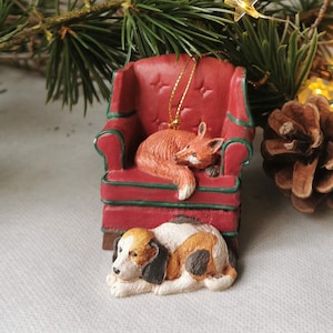 Vintage Midwest ornament - Cannon Falls 1980s, ironic series about fox hunting in England. Armchair with fox and dog.