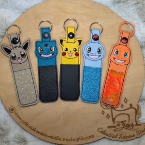 Chapstick, backpack, keychain