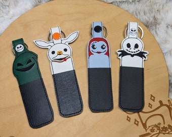 Chapstick, backpack, keychain