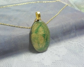 Gold and green polymer clay and resin pendant necklace