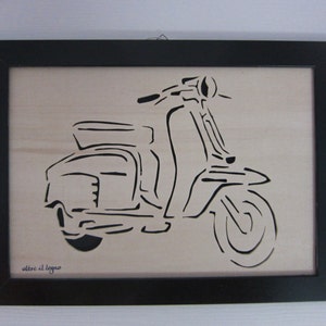 May include: Black and white silhouette of a vintage scooter in a black frame on a light wood background. The text "oltre il legno" is visible in the bottom left corner of the image.