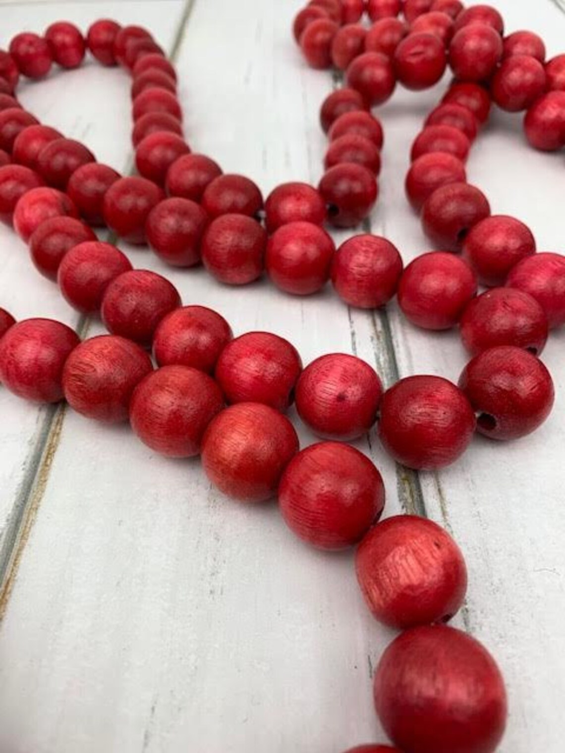 String of red wood beads Red wood beads on a string Red bead Etsy