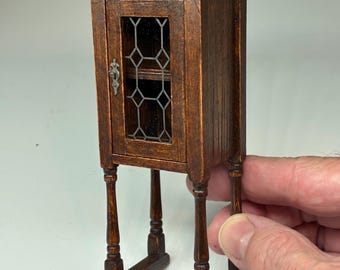 Raised small cupboard