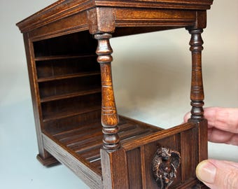 Tester bed featuring bookcase headboard