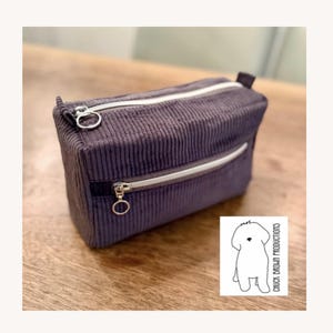 May include: A set of three ceramic mugs with a speckled, matte finish. Each mug is a different colour: light blue, cream, and grey. The mugs have a simple, modern design, ideal for coffee or tea.