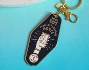 ON SALE: Procrastination Motel Enamel Keyring