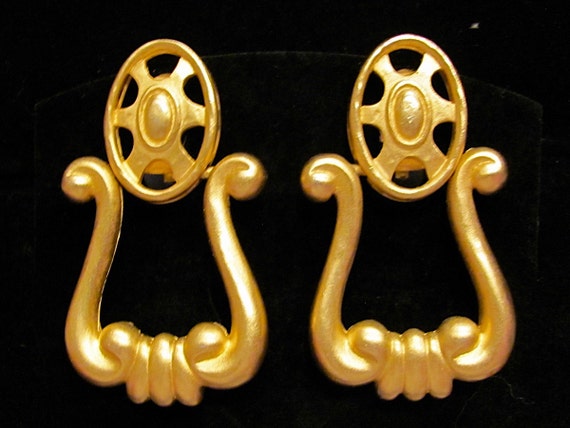 1980s Chanel Logo Gold and Leather Clip Earrings, Iconic - MRS Couture