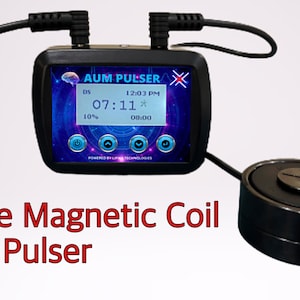 May include: A black AUM PULSER device with a digital display showing the time, a percentage, and a timer. The device is connected to a black magnetic coil.