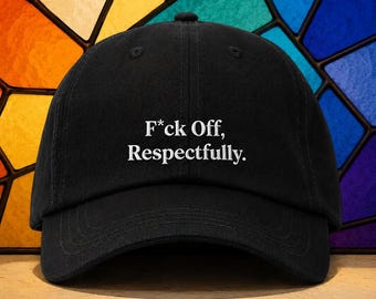 May include: Black baseball cap with the text "F*ck Off, Respectfully" in white. The cap is made of a durable fabric and features a curved brim. The background is a colorful stained-glass window.