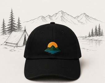 May include: Black baseball cap with an embroidered mountain and sunset design. The design features a yellow sun, green mountains, and blue water. The cap is a classic six-panel design with a curved brim, perfect for outdoor activities.