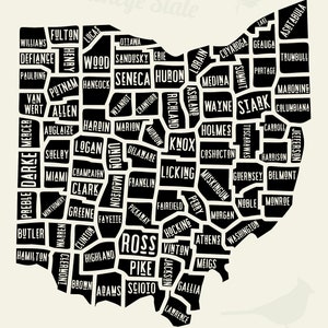 May include: A black and white map of Ohio with the name of each county in the state. The map is in the shape of the state of Ohio. The text "The Buckeye State" is written in a cursive font above the map. The text "Ohio Travel Map County Decal" is written in a bold font above the map.