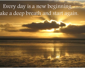 May include: A motivational quote, "Every day is a new beginning. Take a deep breath and start again." is displayed over a photograph of a golden sunset over a calm body of water.