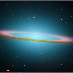 May include: A vibrant, colorful image of a galaxy with a bright, blue, and orange ring. The ring is surrounded by a dark blue background with scattered stars.