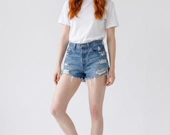 vintage 501s Levis cut off jean shorts denim distressed button fly size 31