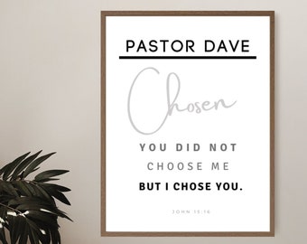 May include: A framed print with a white background and black text that reads "PASTOR DAVE" and "Chosen". The text "YOU DID NOT CHOOSE ME BUT I CHOSE YOU." is also included in black text. The text "JOHN 15:16" is in smaller black text at the bottom of the print.