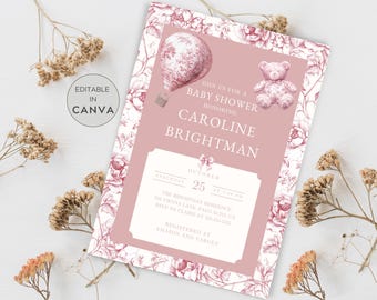 May include: A pink and white baby shower invitation with a floral border. The invitation features a hot air balloon with a teddy bear and the text "Join us for a baby shower honouring Caroline Brightman".