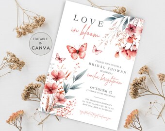 May include: A floral bridal shower invitation with a watercolor design featuring pink flowers, butterflies, and greenery. The text reads "Love in Bloom" and includes the bride's name, "emifa brightman", the date, "October 25", and the time, "2 o'clock in the afternoon".