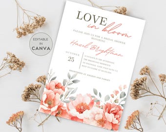 May include: A bridal shower invitation featuring a floral design. The invitation reads "Love in Bloom" and includes the date "October 25" and the time "12 o'clock in the afternoon". The invitation also includes the name "Hazel Brightman" and the address "555 Magnolia Lane, Palo Alto, CA".