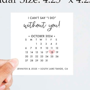 May include: A white card with black text that says "I can't say "I do" without you!" and features a calendar for October 2024 with a pink heart on the 18th. The card also includes the text "Jennifer & Jesse - South Lake Tahoe, CA". The card measures 4.25 inches by 4.25 inches.