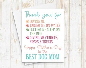 May include: A card with a paw print design and the text "Thank you for loving me, taking me on walks, letting me sleep on the bed, giving me cuddles, kisses & treats. Happy Mother's Day to the best dog mom."