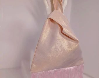 Blush Pink and gold tone metallic Knot bag with Fringe