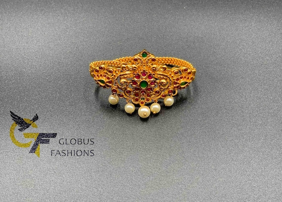 Gold bajuband shop peacock design