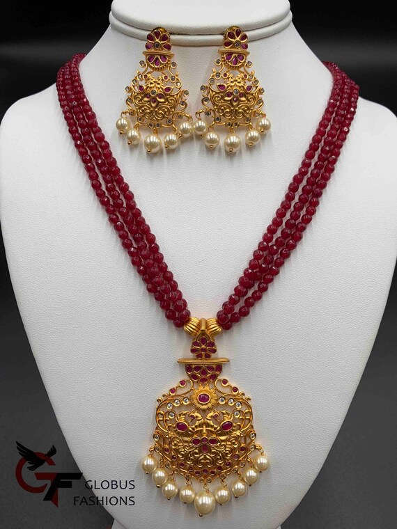 Ruby beads with gold pendant deals