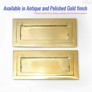 May include: Two rectangular gold-toned door pulls with a recessed centre and a simple, elegant design. The text "Available in Antique and Polished Gold finish" is displayed at the top. The pulls are shown in a polished gold finish.