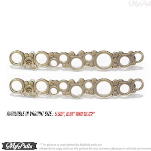 May include: Two gold-toned metal cabinet pulls with a design of overlapping circles. The pulls are available in three sizes: 5.90 inches, 8.81 inches, and 10.62 inches.