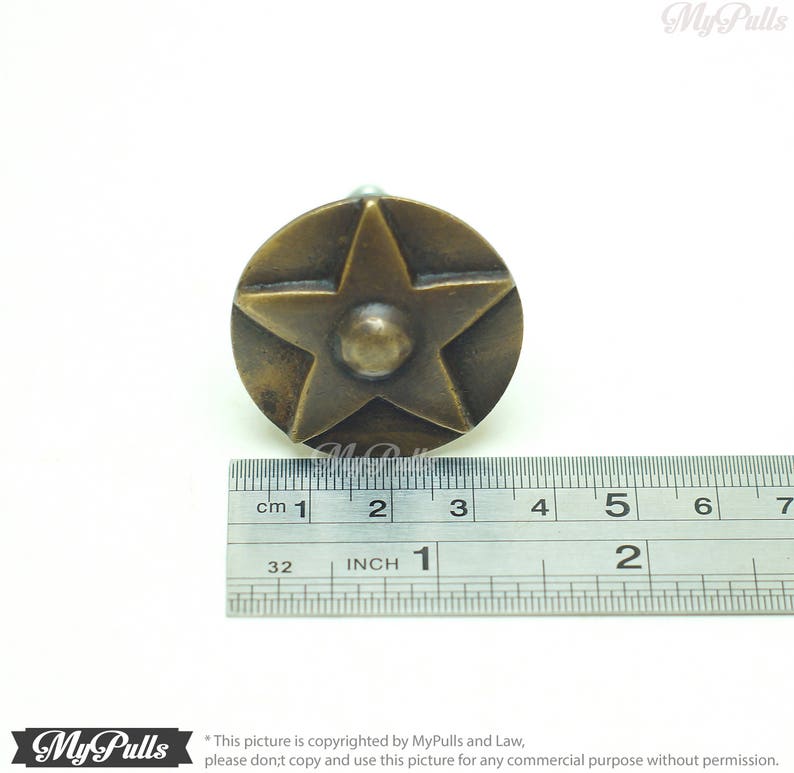 Rustic brass star knobs for farmhouse cabinet