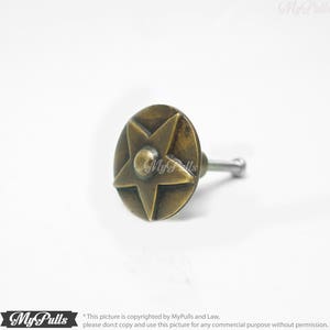 Cowboy themed brass knobs for cabinet upgrade