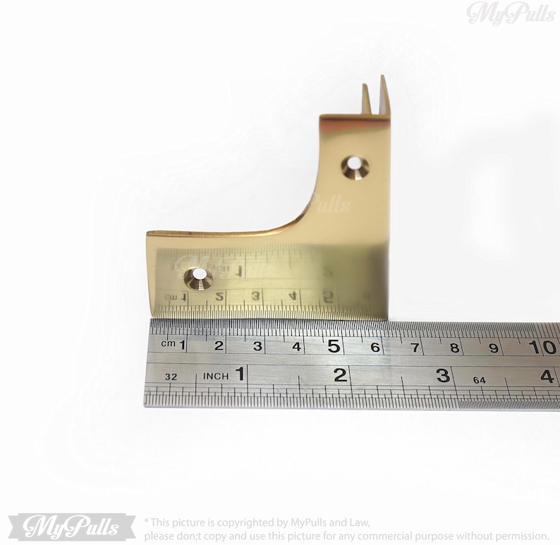 Gold brass corner protectors for cabinet edges
